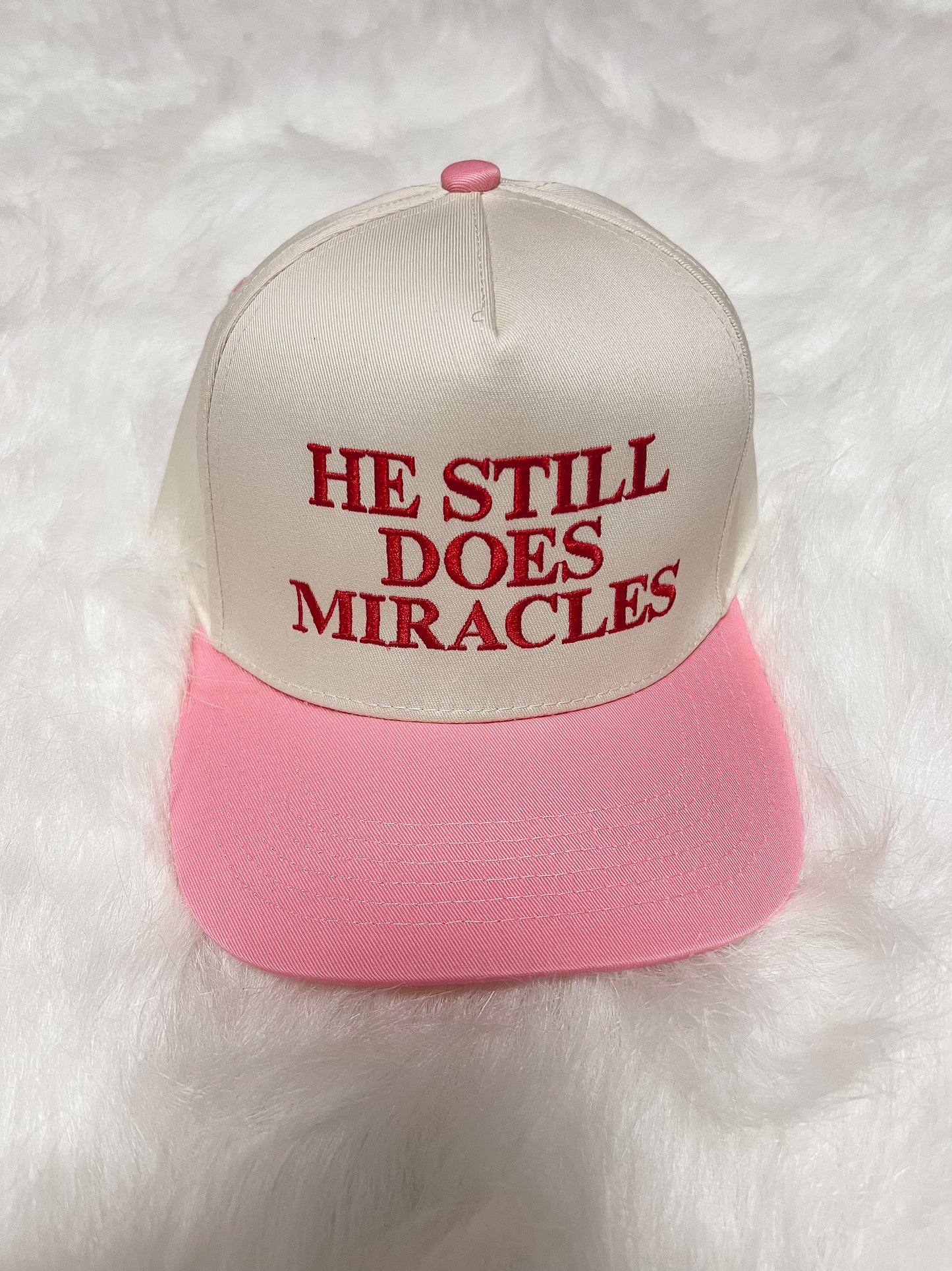 “He still does Miracles” trucker hat
